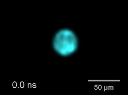 A shockwave created by a laser striking water propagates in slow motion, as captured by a new ultrafast photography technology