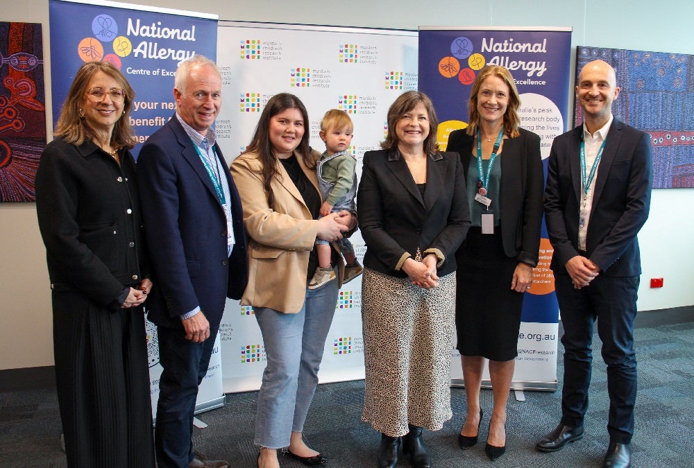 Professor Sharon Goldfeld, Professor Andrew Sinclair, Kirsten Chatwin with Hunter, Federal Assistant Minister for Health Ged Kearney, Professor Kirsten Perrett and Dr Tim Brettig during the ADAPT announcement at MCRI.