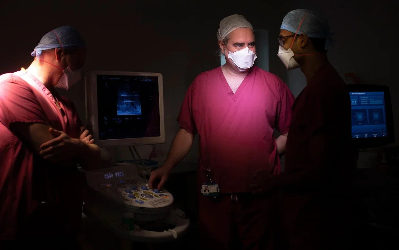 Consultant urologist Alistair Grey, who led the first operations using the technique, and his team. 