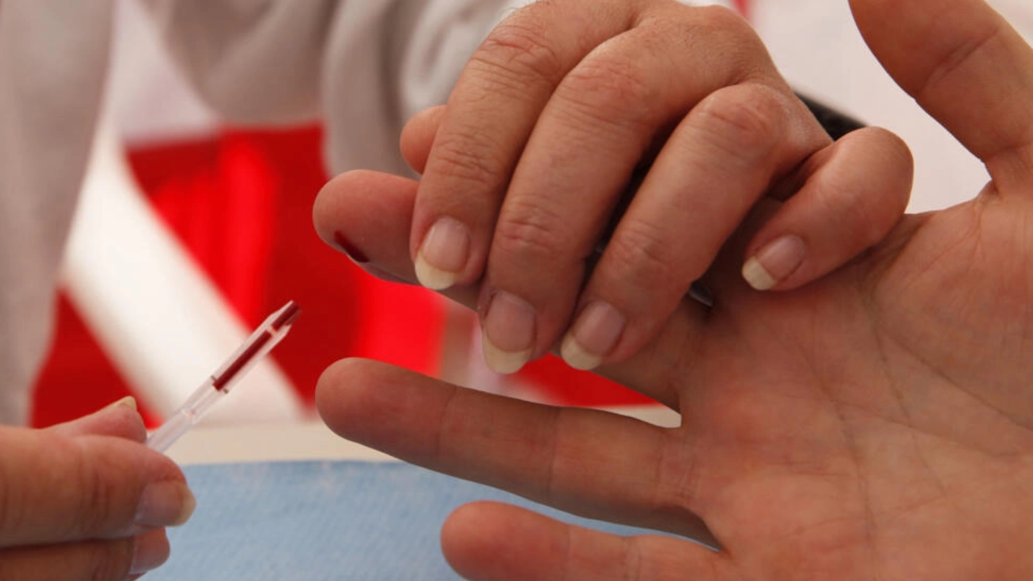 A man undergoes a screening for HIV in Monaco.