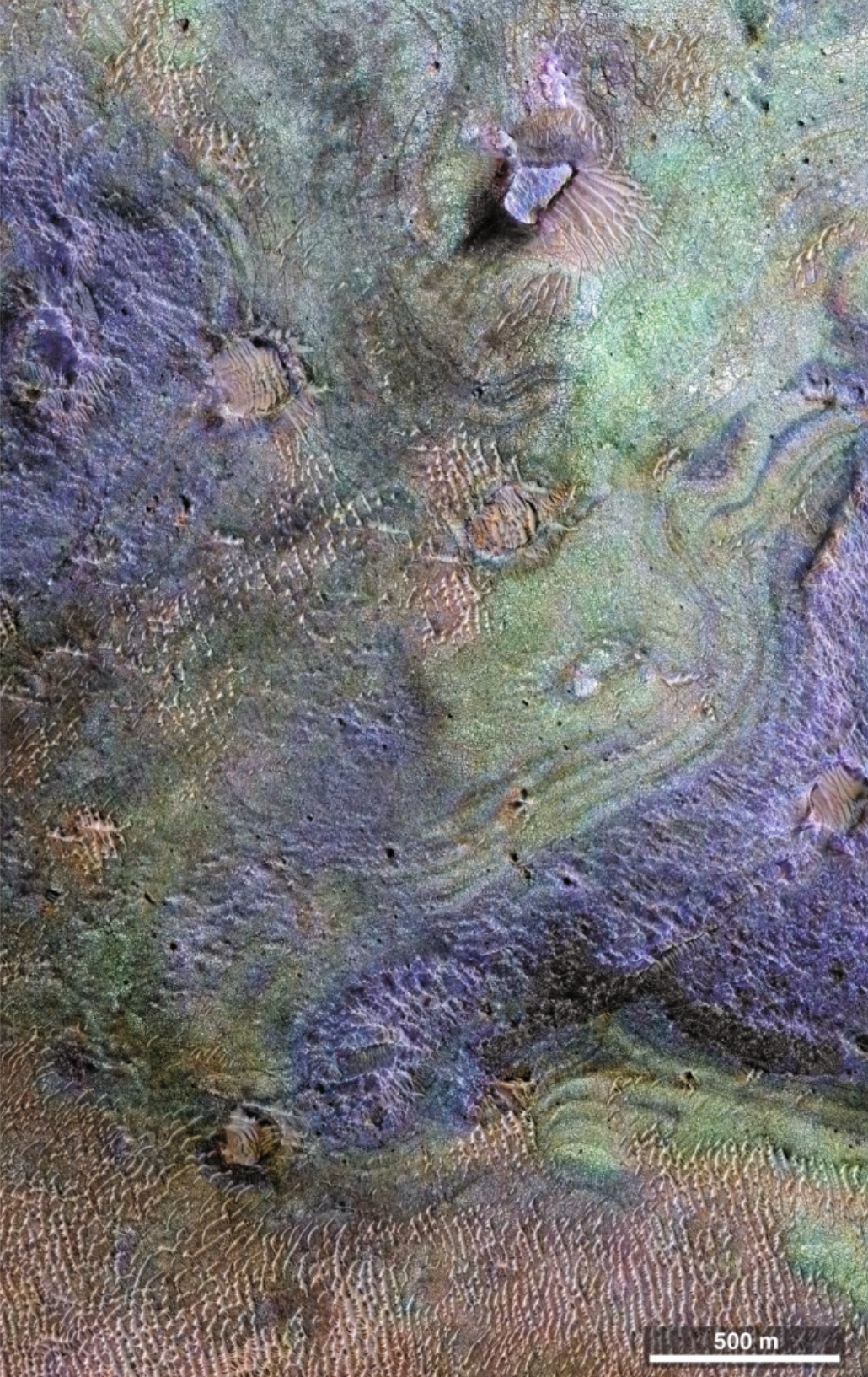 A high-resolution image from the HiRISE (High-Resolution Imaging Science Experiment), with a false-colour compositional image from the CRISM (Compact Reconnaissance Imaging Spectrometer for Mars) superimposed on it.