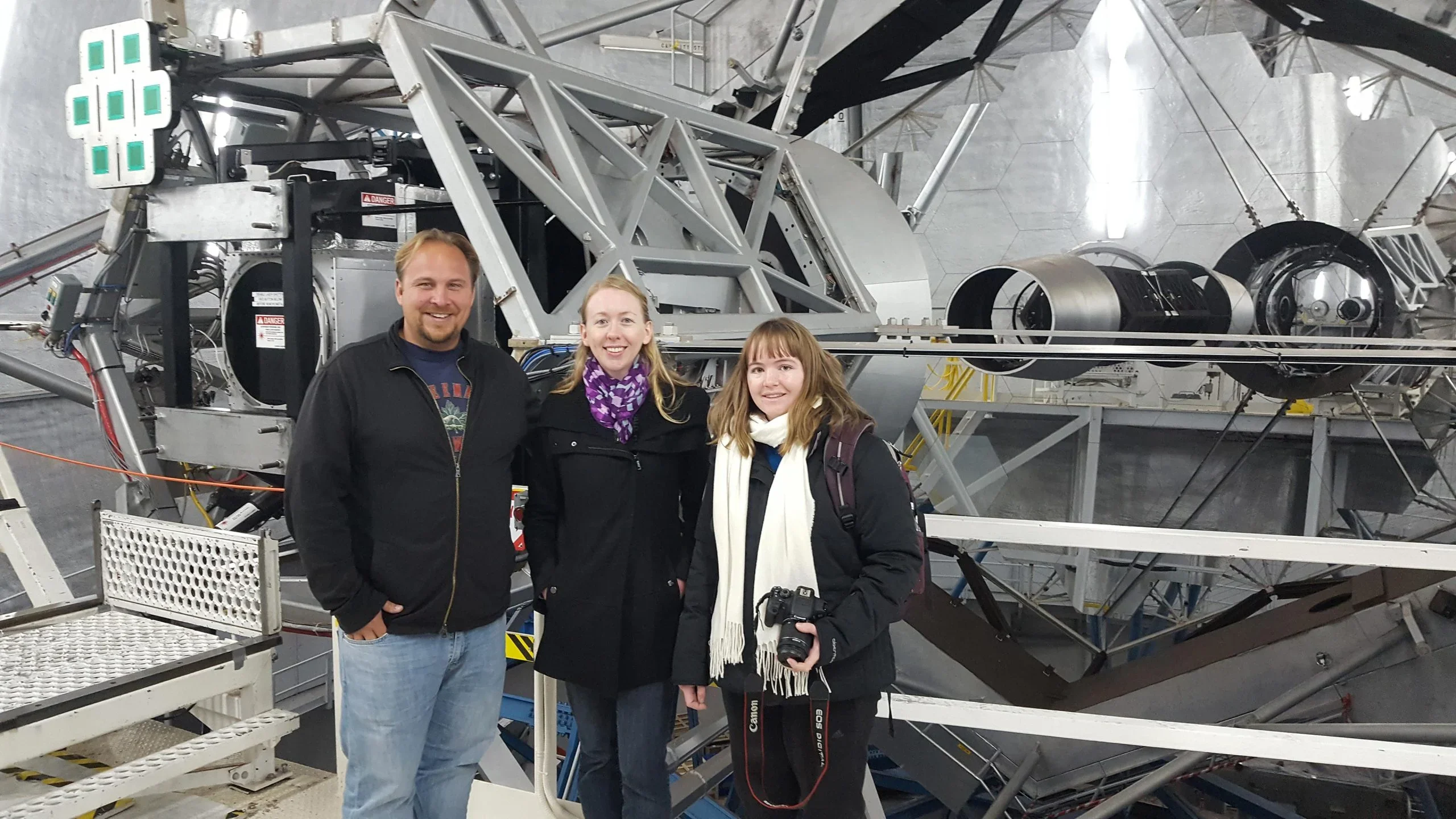 Lead author, Nikki Nielsen with colleagues Glenn Kacprzak and Stephanie Pointon in front of the Keck mirror.