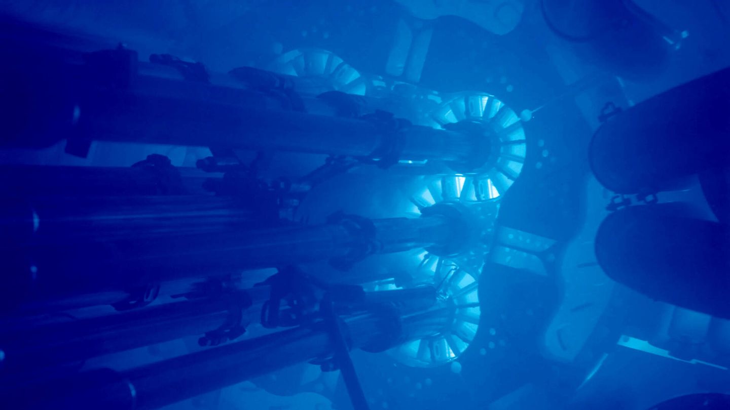 The blue glow of Cherenkov radiation in a nuclear reactor, one of the ways hypothetical tachyons can be detected. 