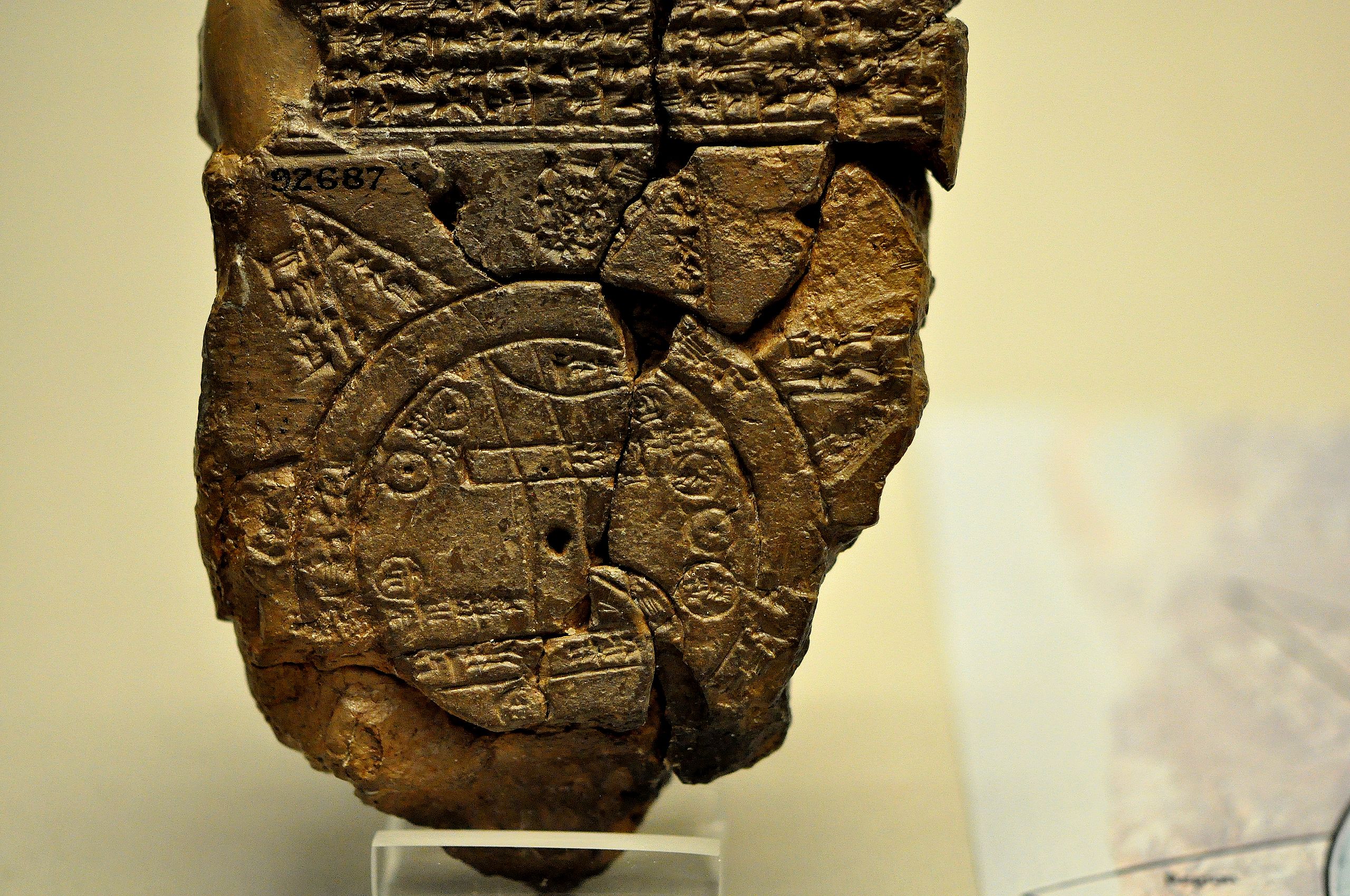 A close-up view of the Babylonian map of the World. This partially broken clay tablet contains both cuneiform inscriptions and a unique map of the Mesopotamian world. Probably from Sippar, Mesopotamia, Iraq. 700-500 BCE. 
