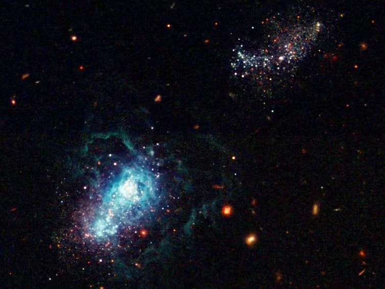 A galaxy estimated to be as young as 500 million years old, making it one of the youngest galaxies seen. A galaxy estimated to be as young as 500 million years old, making it one of the youngest galaxies seen.