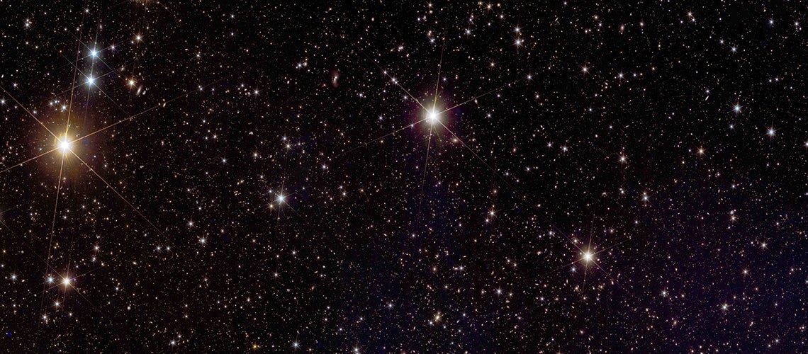 Gravitational lensing of distant galaxies by the galaxy cluster Abell 2390, observed by the Euclid satellite. 