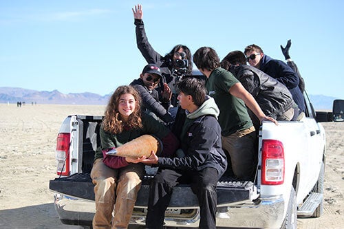 The USCRPL team with the rocket before liftoff.