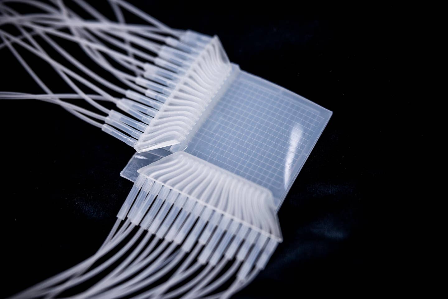 The pneumatic touchpad is made of soft silicone. It contains 32 channels, each only a few hundred micrometres wide, that adapt to touch. Pneumatic sensors can collect much data by touch.