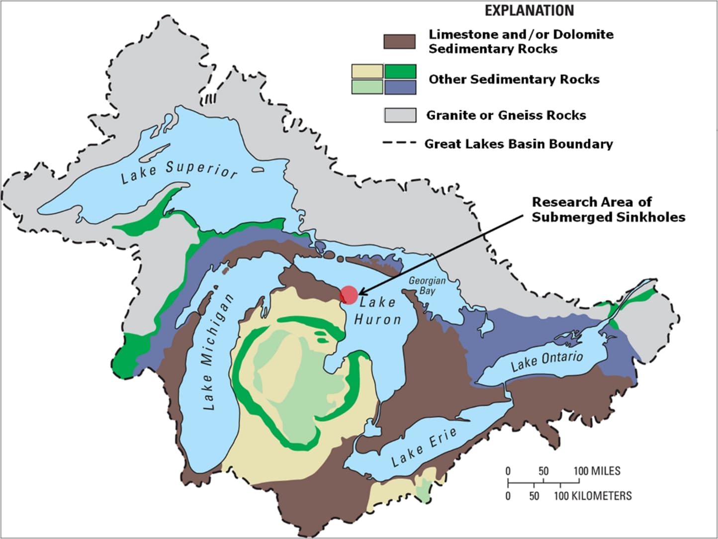 Map of the Great Lakes basin showing the geological context. Arrow and red circle indicate the location of several submerged Lake Huron sinkholes, including the Middle Island Sinkhole. 