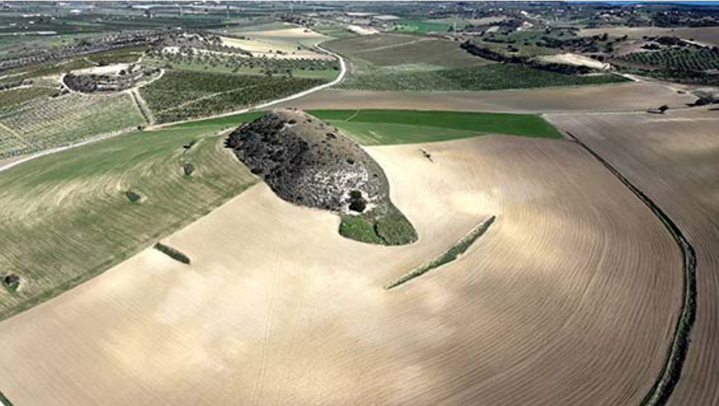 Aerial photo of a ridge eroded by the megaflood located north-east of Masseria del Volpe, south-east Sicily. 