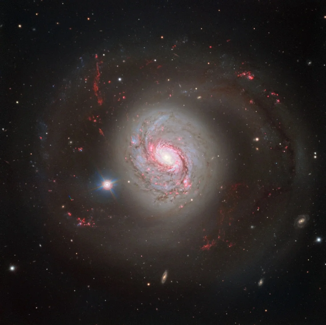 An image of the spiral galaxy NGC 1086 obtained by the European Southern Observatory’s Very Large Telescope (VLT). The galaxy has a distance of 47 million light-years and is one of the nearest galaxies with an active galactic nucleus. 