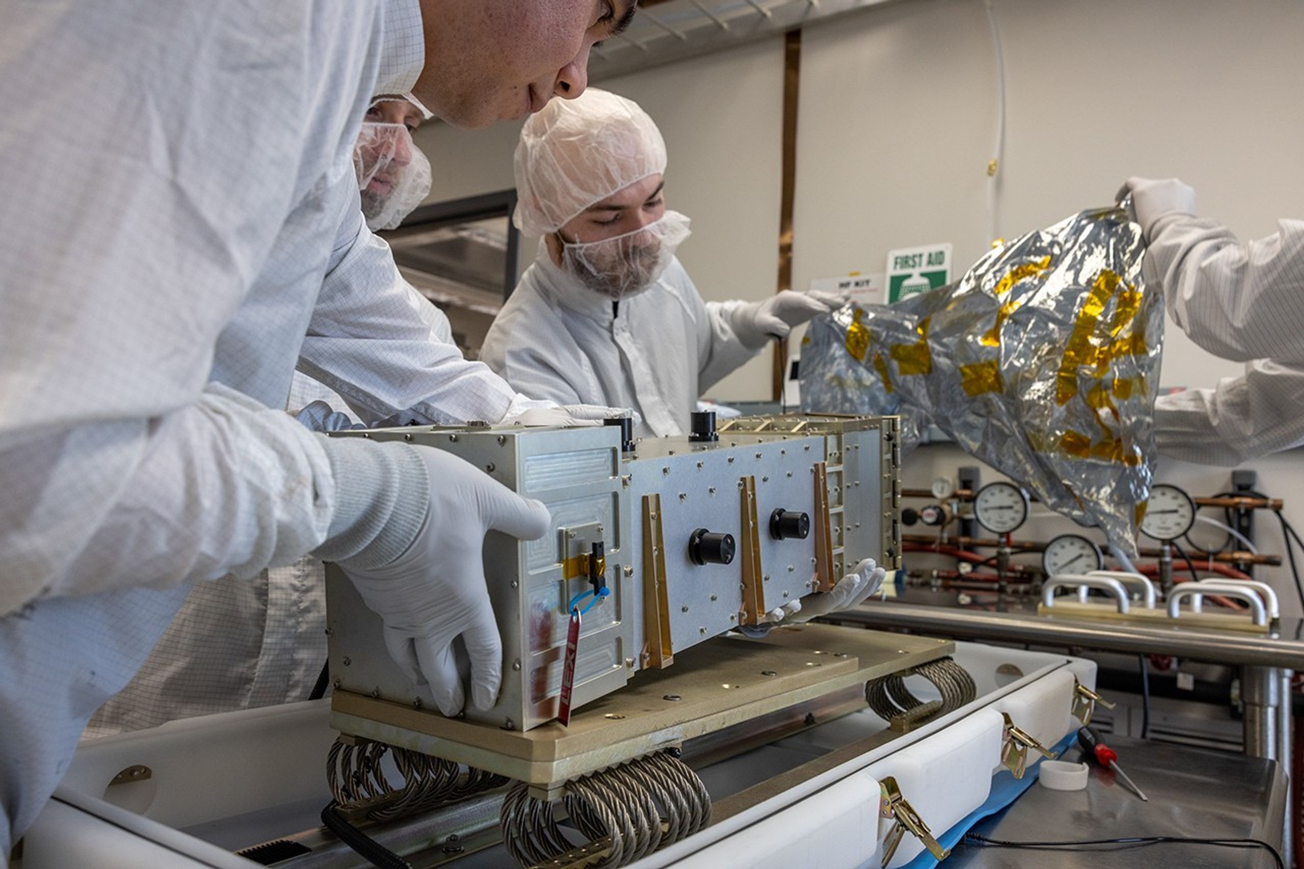 The LEXI team packs the instrument at Boston University.
