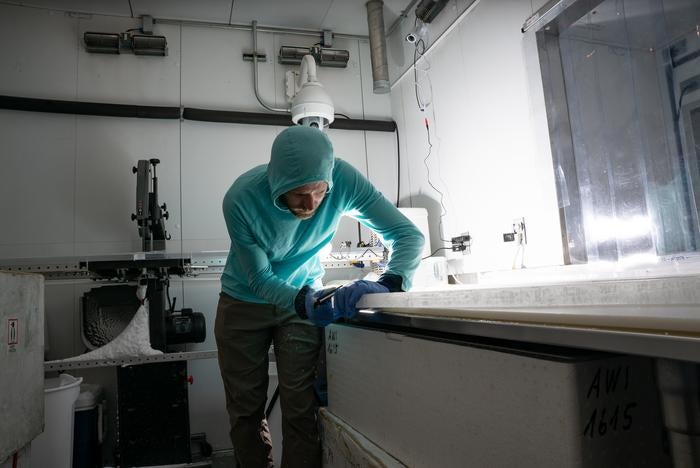 Carefully preparing the longitudinal ice core samples for high-resolution lead measurements