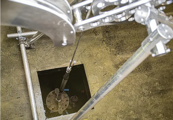 A close-up view from above of the SysMoG™ probe in position before being lowered into the borehole. The monitoring device was miniaturized to fit into a shaft 6 cm in diameter.