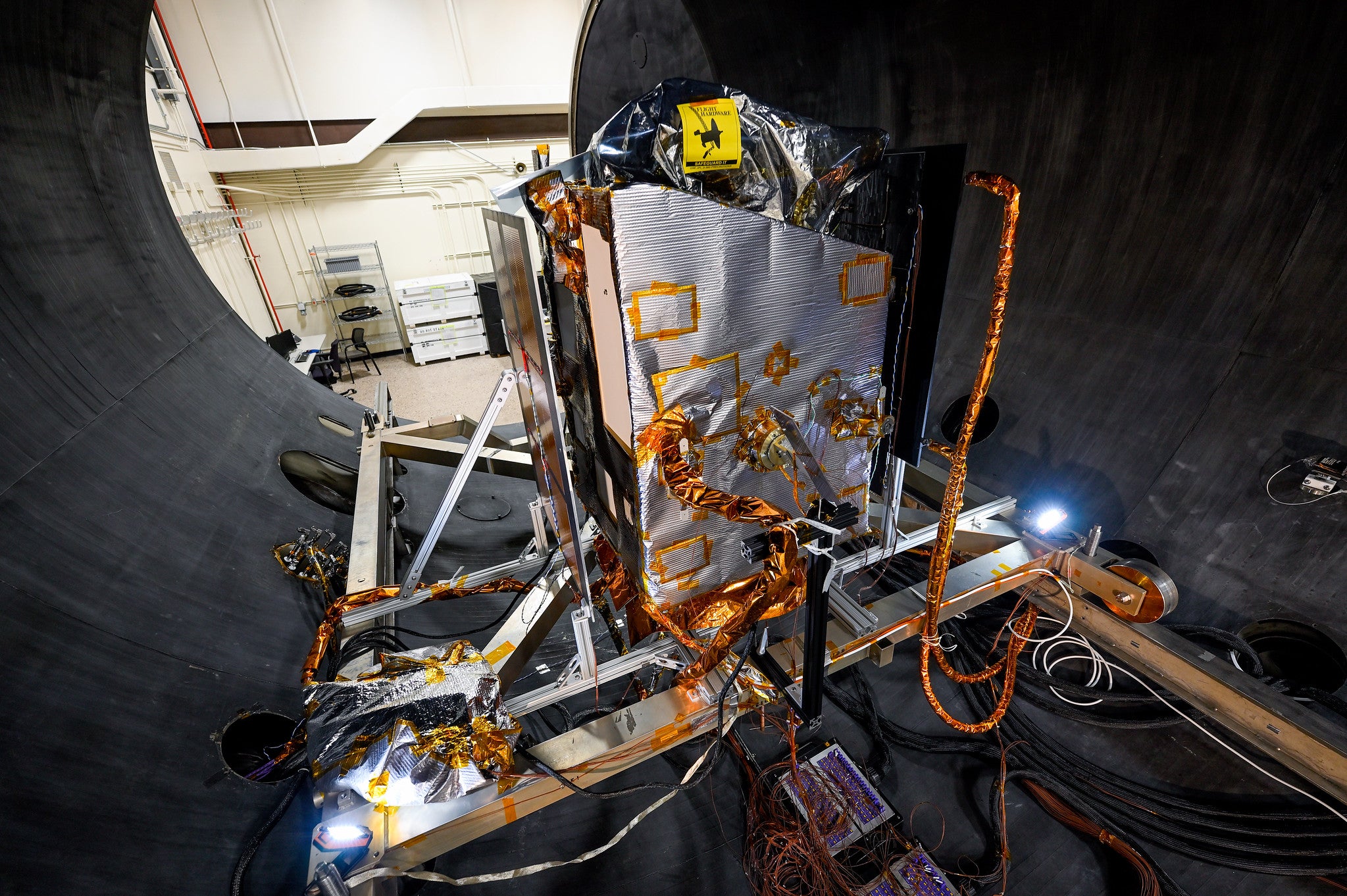 NASA's Lunar Trailblazer spacecraft is seen here inside the thermal vacuum test chamber at Lockheed Martin Space in Littleton, Colorado.