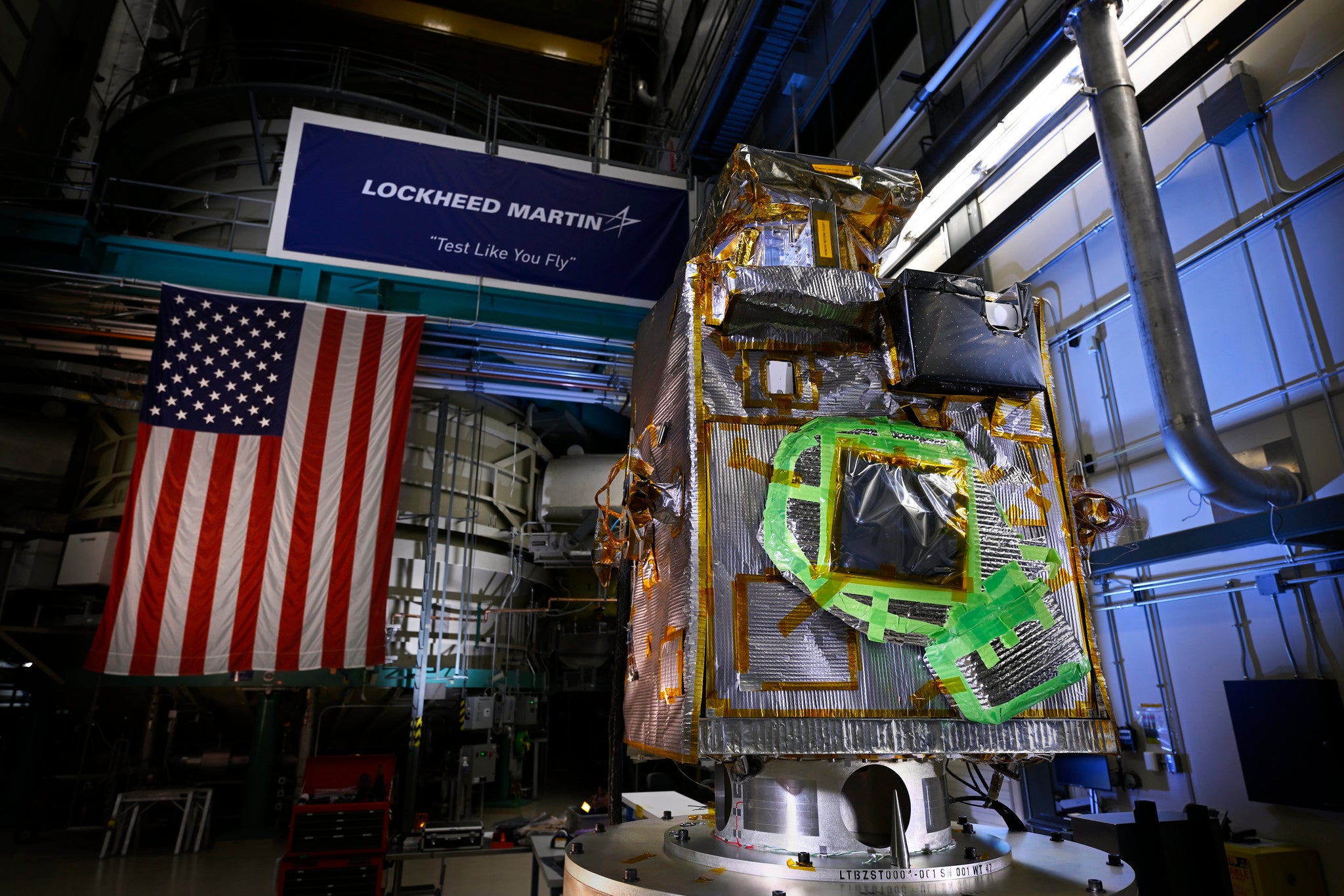 NASA’s Lunar Trailblazer in a Lockheed Martin clean room shows off its Lunar Thermal Mapper (LTM) instrument, which is the black rectangular box in the upper right of the spacecraft’s body. The instrument will provide maps of lunar surface temperature from about -265 degrees Fahrenheit to 266 degrees Fahrenheit.