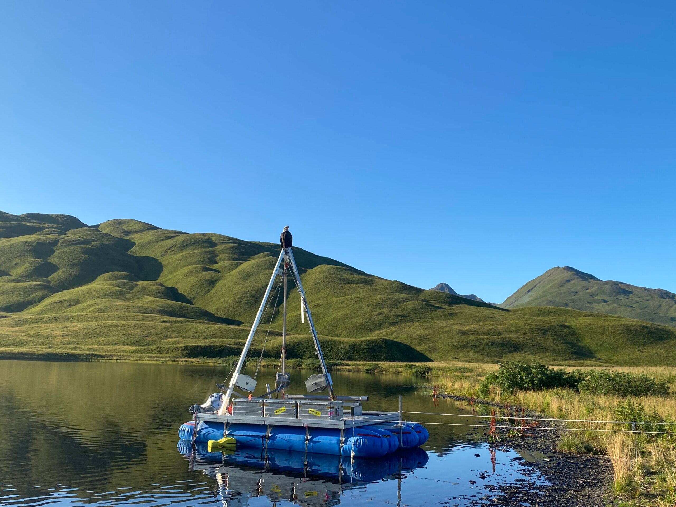 Floating drilling platform for extracting sediment cores from lakes, Alaska. 