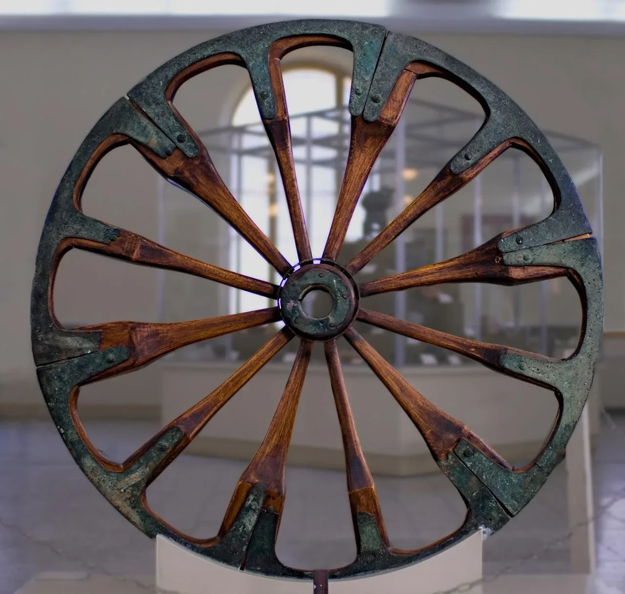 Ancient spoked wheel from 2nd millennium BCE, from the collection excavated by the ziggurat of Chogha Zanbil, Iran, on display at The National Museum of Iran.