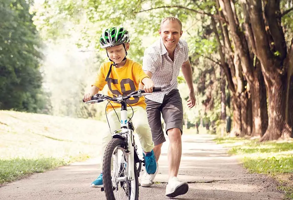 Studies show that fathers tend to prioritize physical activity with their sons. 