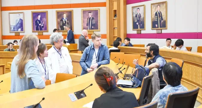 Global scholars gather in Hong Kong to discuss ethics of AI. Yaqub Chaudhary on the right.