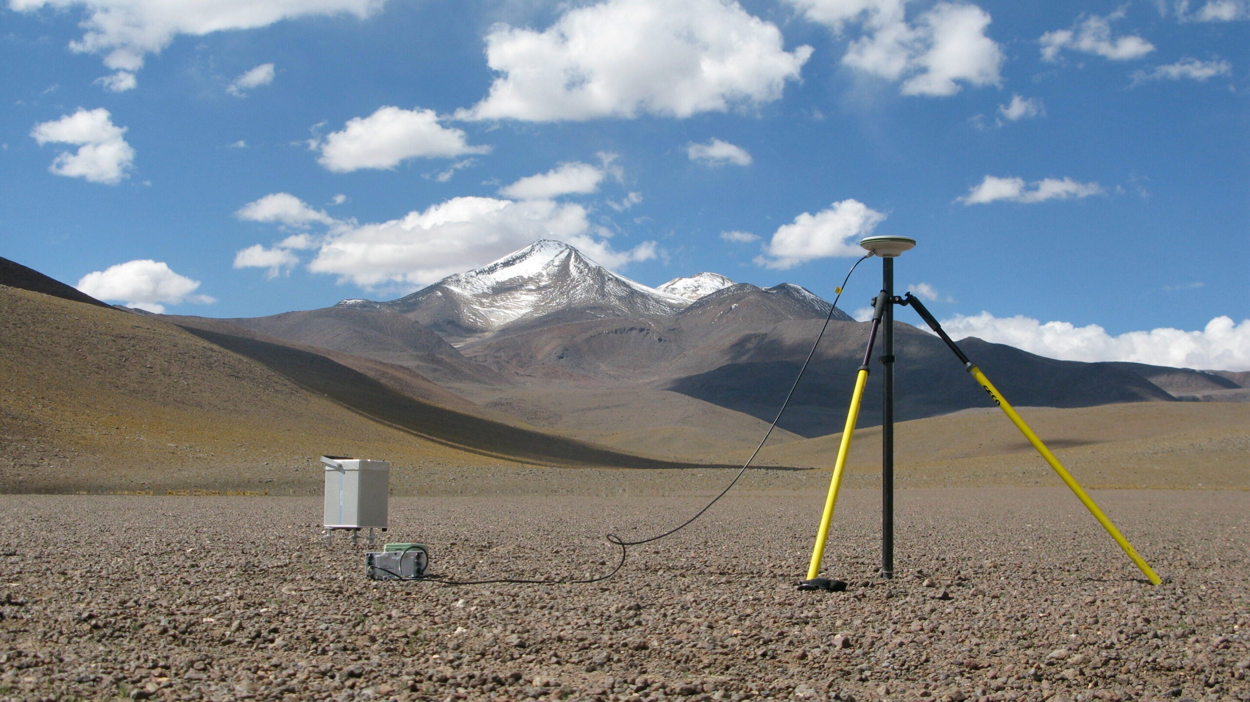 Gravimeter and GPS station with Cerro Uturuncu in the background.