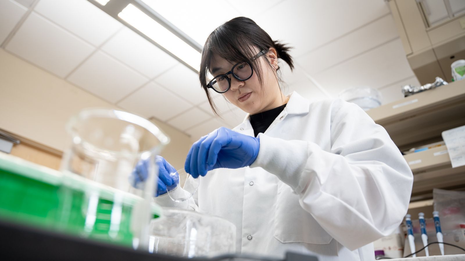 UNLV Lab undergraduate student researcher Emilie Luong interacts with hydrogel in the Da Kine Lab at University of Nevada, Las Vegas.