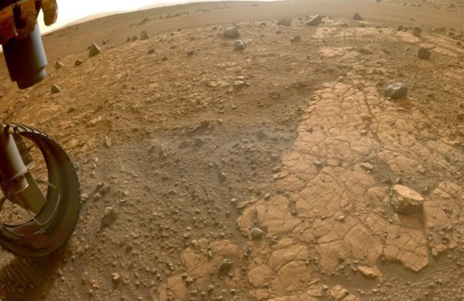 This image from NASA's Perseverance Rover reveals sandstone at the base of Jezero Crater. Scientists believe this feature was created by water carrying fine grains of rock into the crater. 