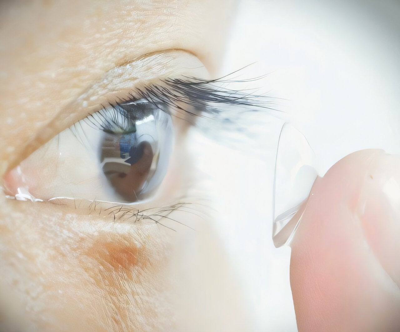 Study participant putting contacts in. 