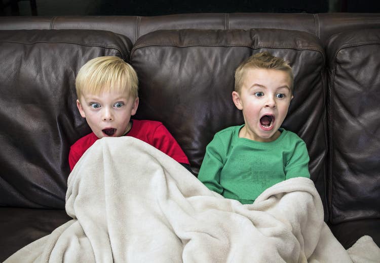 Young child watching violent content on television