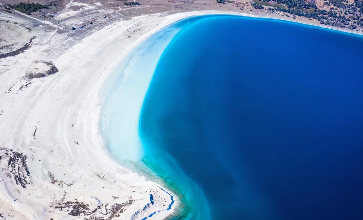 A large soda lake like Mono Lake, with nearly 1 millimolar of dissolved phosphorus, may reveal how the origin of life in soda lakes became possible.