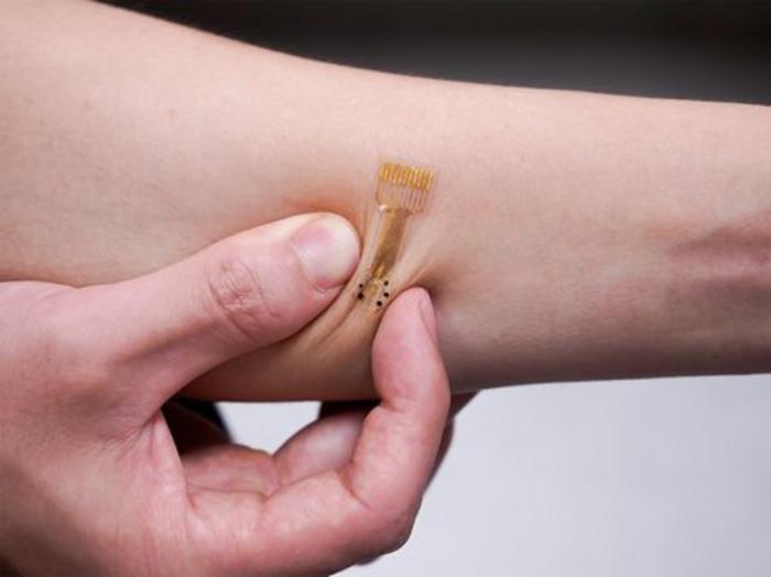 The smart bandage technology developed by Caltech's Wei Gao is flexible and stretches with the skin.