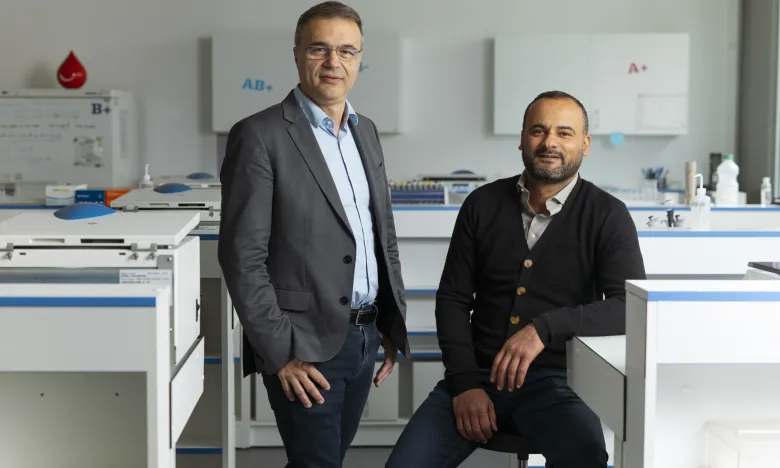 Thierry Peyrard, head of the EFS, and Slim Azouzi, a researcher specializing in rare blood groups. 