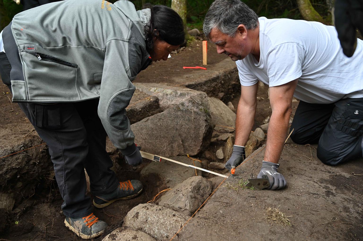 Audrey Blanchard and Jean Noel Guyodo, University of Nantes, during the excavation of Le Plasker. 