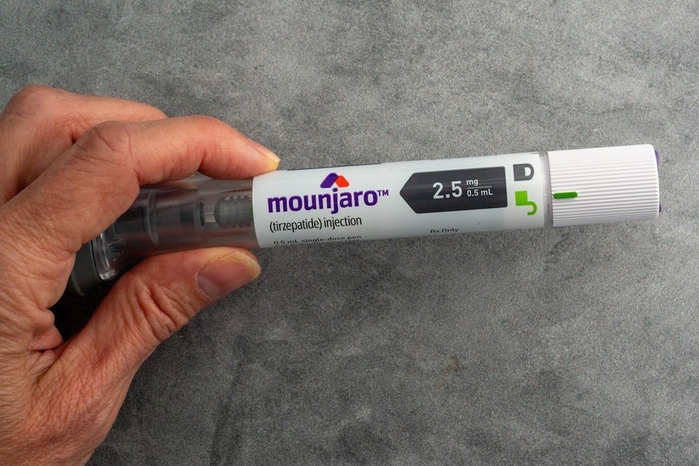 Tirzepatide, sold under the brand names Mounjaro for diabetes and Zepbound for obesity, works by stimulating two key hormone receptors, GLP-1 and GIP.
