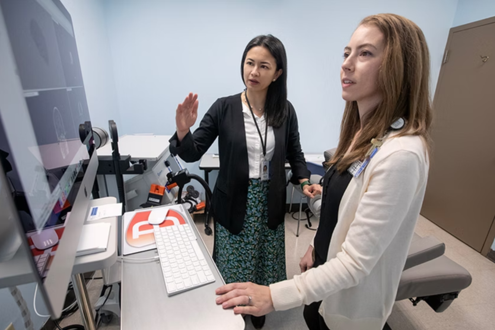 Medical University of South Carolina neuroscientists Dr. Andreana Benitez (in back) and Dr. Stephanie Fountain-Zaragoza, Ph.D. (in front) discuss a neuroimaging result. 