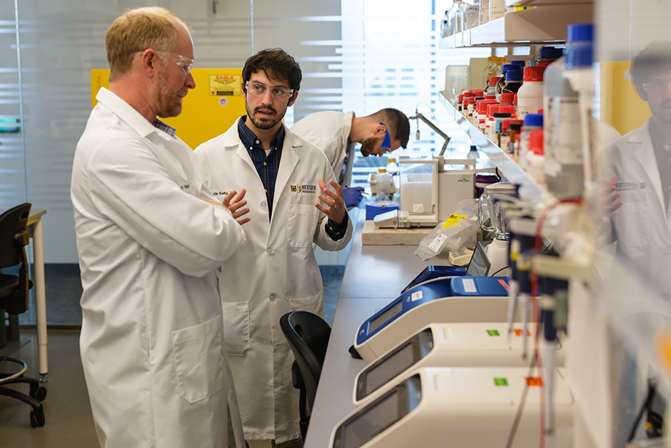 Scott Rector and Taylor Kelty work in the NextGen Precision Health building.