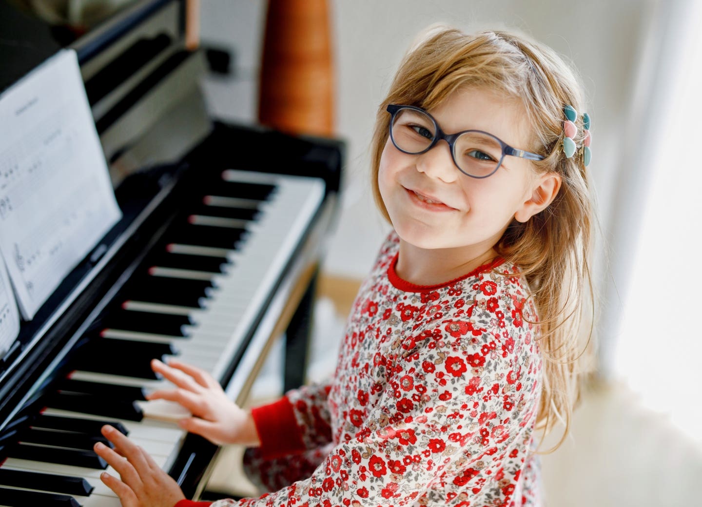 Learning music improves confidence, connection, and school focus in kids and teens, says new research review.