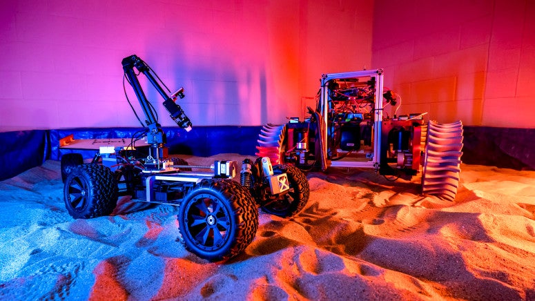 A rover on sand in the Simulation-Based Engineering Lab.