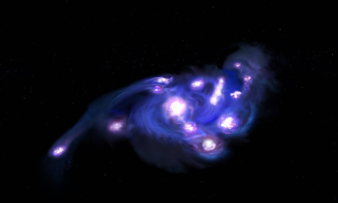A galaxy from the early universe, nicknamed Cosmic Grapes, is brimming with 15 massive star-forming clumps, giving astronomers a new look at how young galaxies evolve.