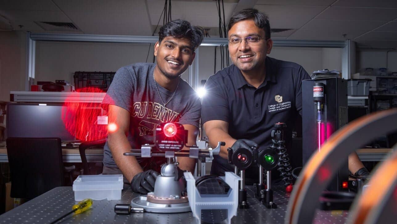 Graduate student Kalyan Tirumalasetty (left) and Assistant Professor of Electrical Engineering Aakash Sahai work on their quantum technology in a lab.