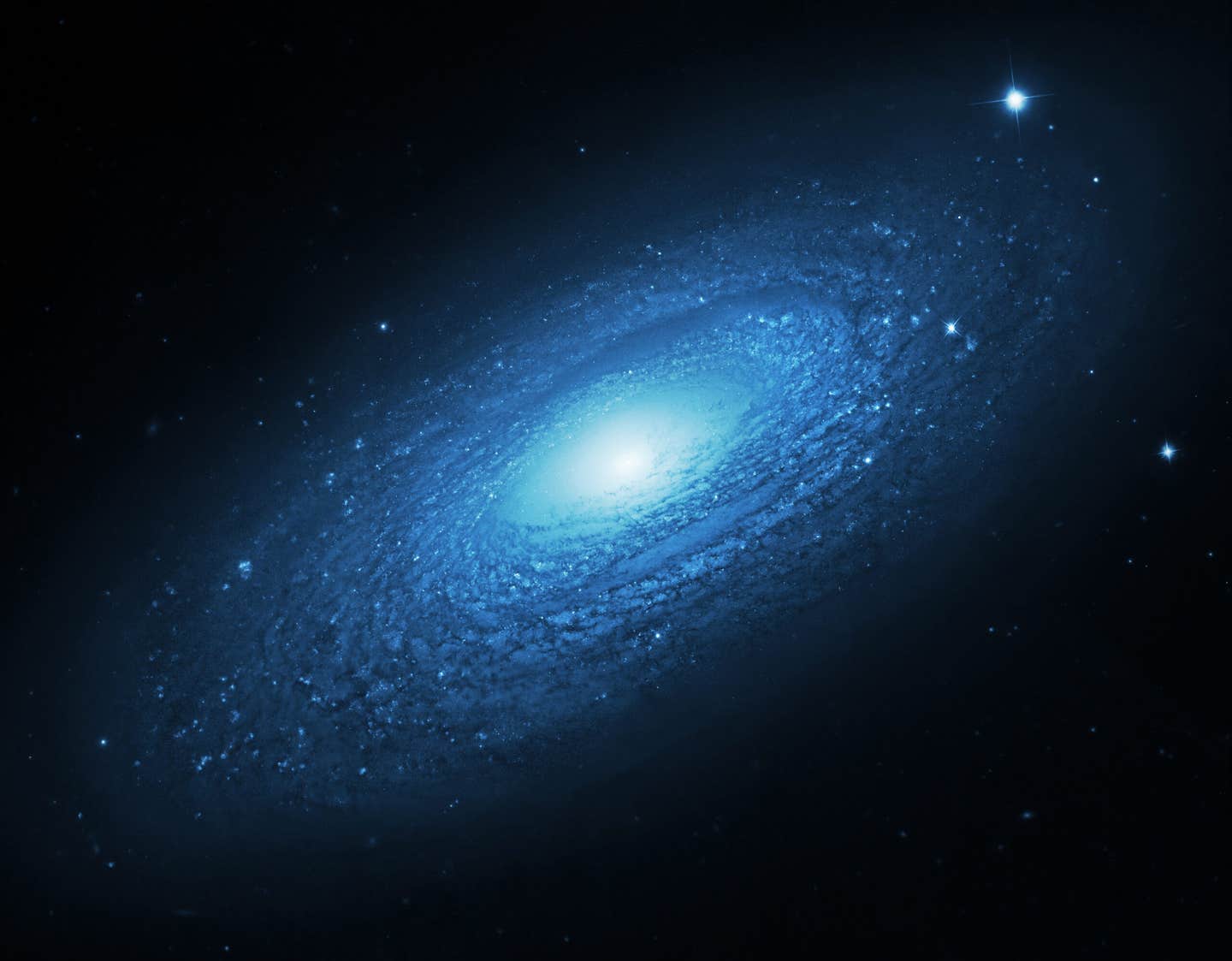 Hidden deep in the cosmos, a massive spiral galaxy is giving astronomers an extraordinary glimpse into what may lie ahead for the Milky Way.