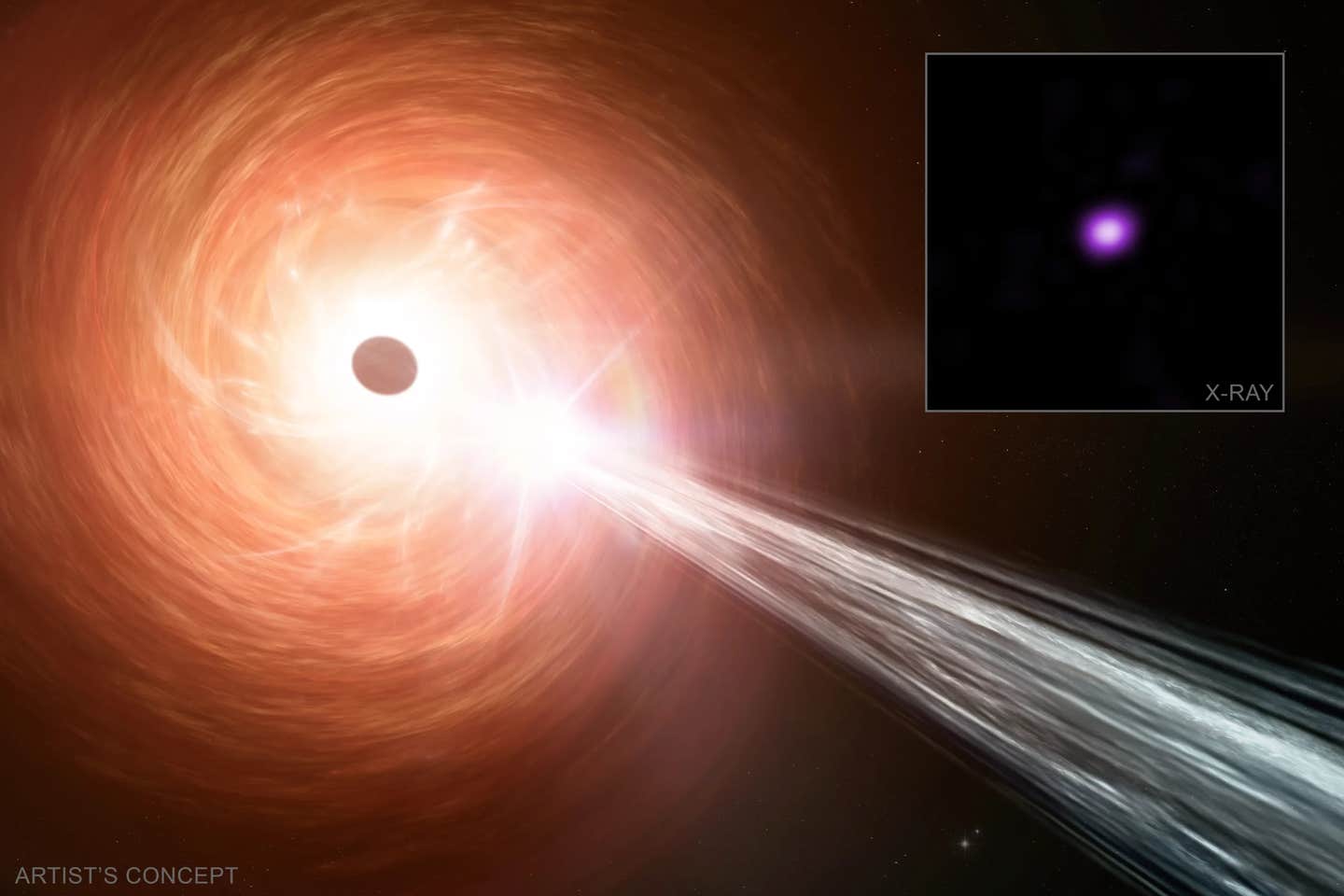 An artist’s concept of a supermassive black hole, a surrounding disk of material falling towards the black hole and a jet containing particles moving away at close to the speed of light.