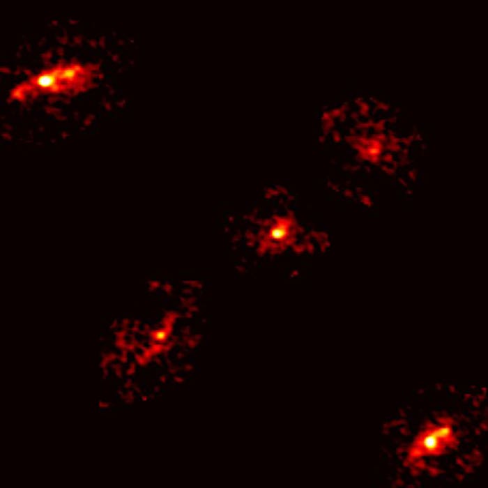 A rare cosmic configuration: An Einstein Cross with five points of light, instead of the usual four, has been discovered by scientists.