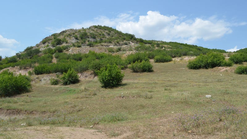 The site, shown here, was originally excavated during the Soviet period and was relocated using hand draw maps from a 1964 book.