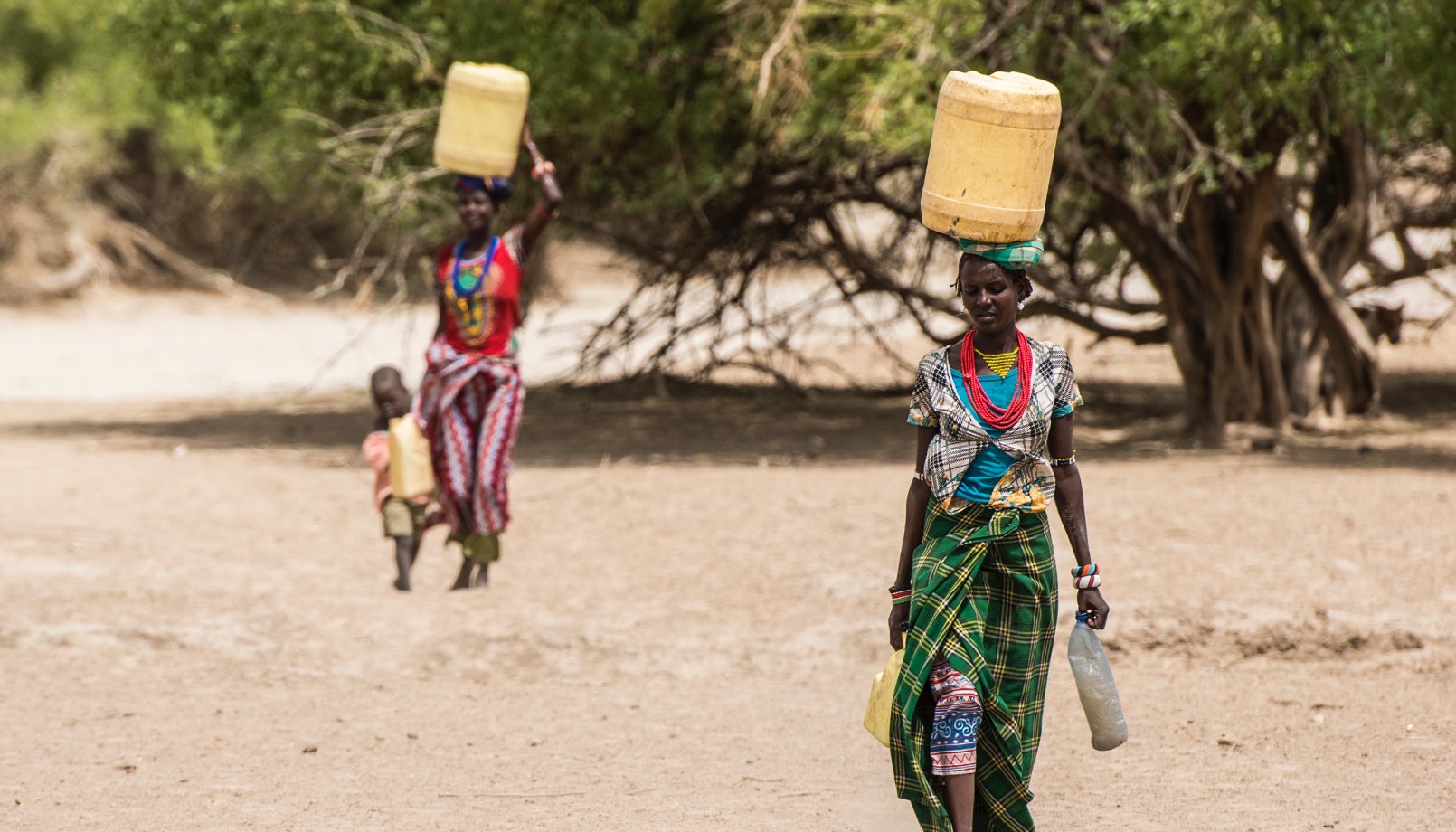 Women of Kenya's Turkana community often walk miles each day in scorching heat to collect water for their animals and personal consumption.