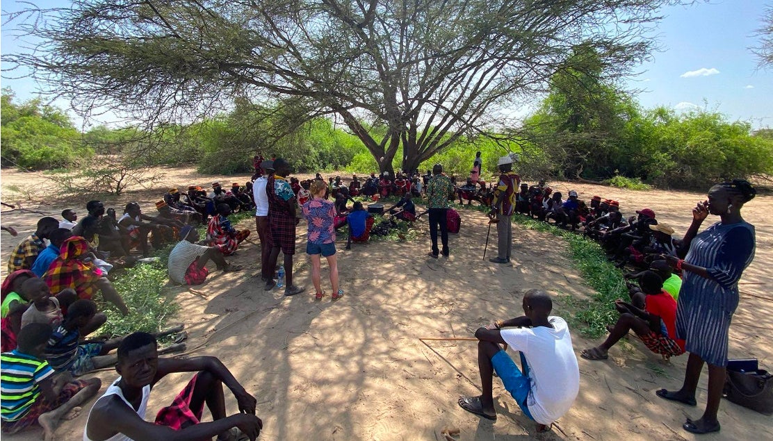 Study team members explaining the project goals to a community, or baraza, near Nakechichok on the Turkwel River, Turkana County, Kenya. 
