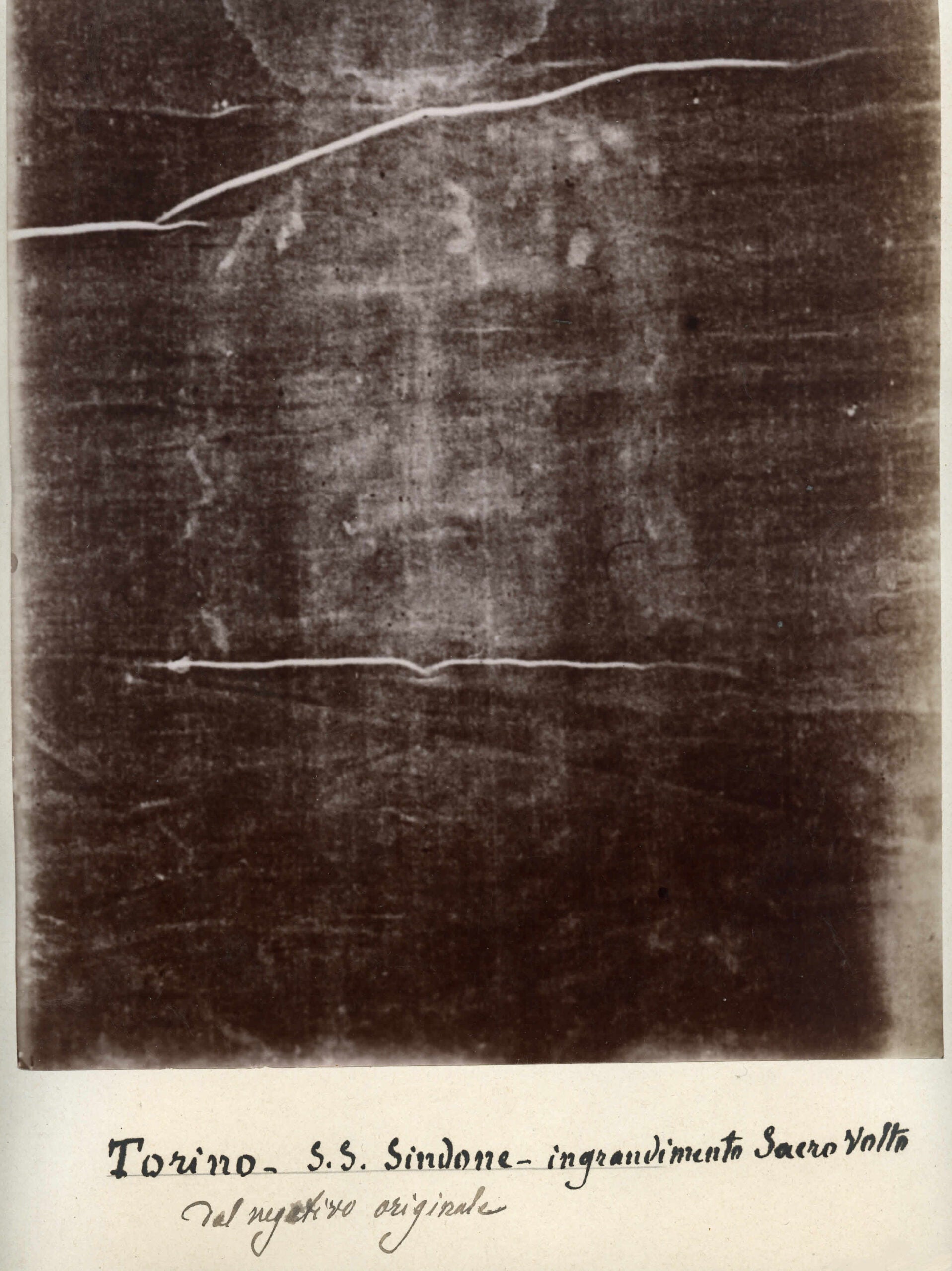 Secondo Pia's 1898 negative of the image on the Shroud of Turin, which has since been used as part of the devotion to the Holy Face of Jesus. 