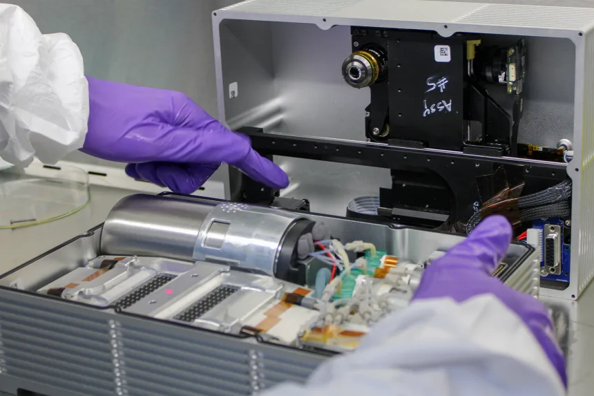 The CubeLab integrated system is equipped with a thermal management system, a microscope imaging system known as TangoScope, and fluid routing systems to transport media to and from cells.