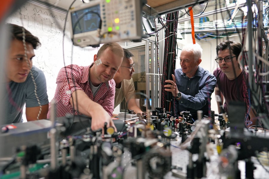 Vladan Vuletić with members of his Experimental Atomic Physics group. From left to right: Matthew Radzihovsky, Leon Zaporski, Qi Liu, Vladan Vuletić, and Gustavo Velez.