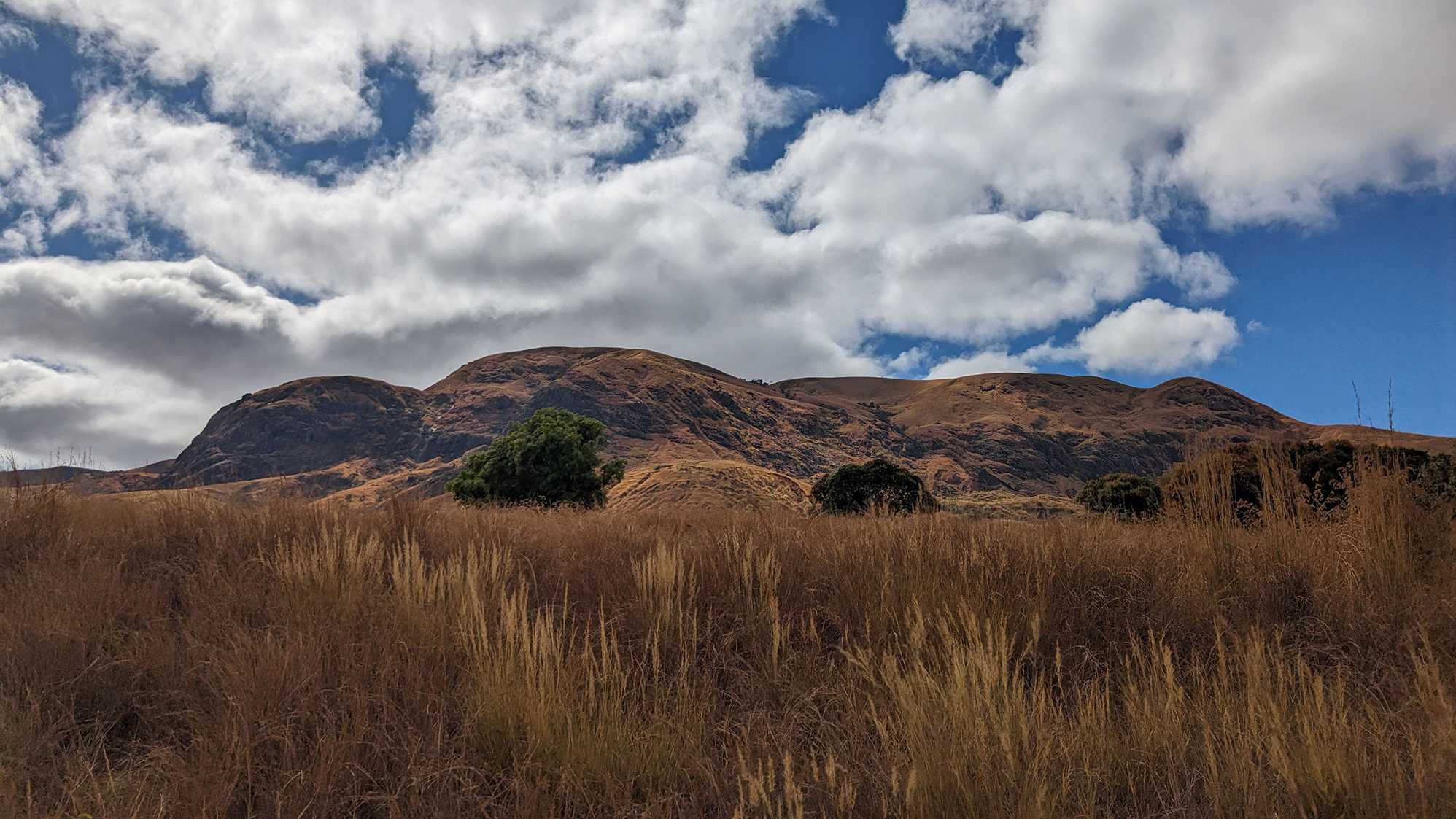The escarpment mountains of western Madagascar. The landscape is dominated by isolated remnant peaks, witnesses of an ancient plateau that has been deeply incised by large river systems over millions of years.